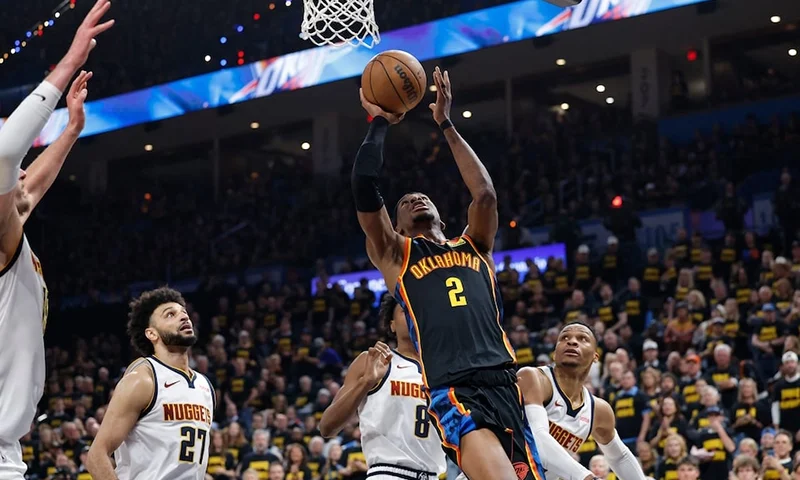 Oklahoma City Thunder guard Shai Gilgeous-Alexander (2) shoots against the Denver Nuggets in the second half during game two of the second round for the 2025 NBA Playoffs at Paycom Center. Mandatory Credit: Alonzo Adams-Imagn Images